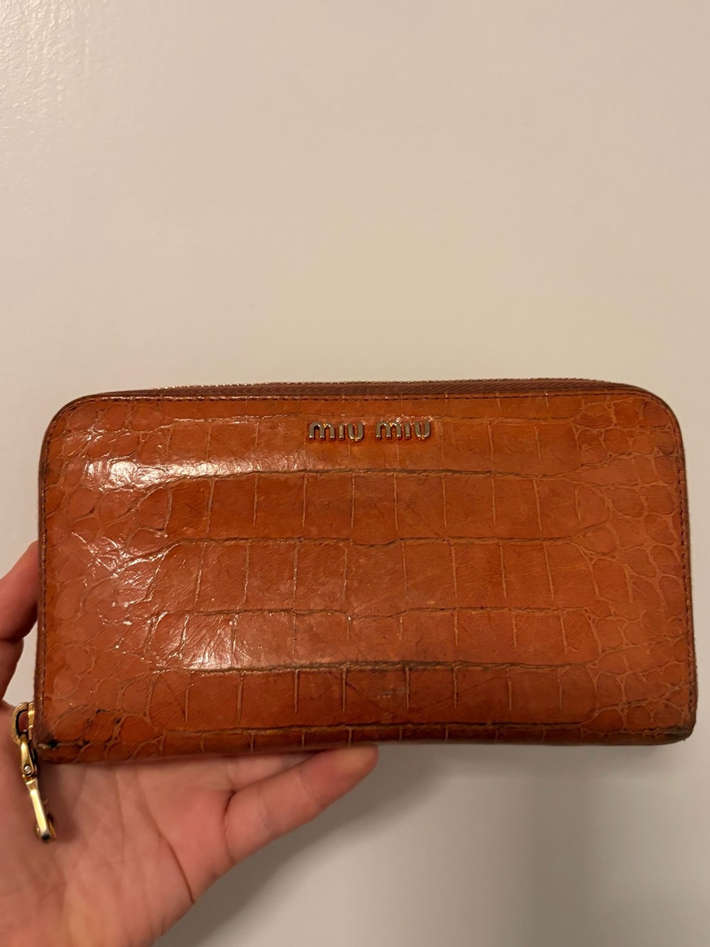 Miu Miu Croc-Embossed Zip Wallet in Cognac Brown with Gold Logo